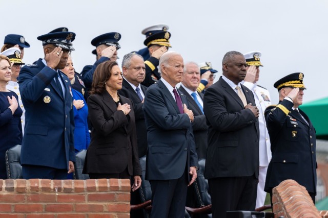 From front left: Air Force Gen. CQ Brown, Jr., Vice President Kamala Harris, President Joe Biden, Secretary of Defense Lloyd J. Austin III and Army Gen. Mark A. Milley attend a ceremony at Joint Base Myer-Henderson Hall, Va., marking Milley&#39;s...