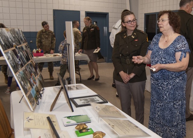 Phyllis Hunsley, whose husband, 1st Lt. Dennis Hunsley, was killed in 1969, while serving in Vietnam, shares a story with 2nd Lt. Molly Sawyer, an Engineer Basic Officer Leader Course student here, during a survivor family remembrance event...