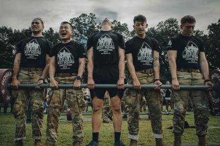 Soldiers deadlift over 450 pounds in unison during the 2023 Army Best Squad Competition Park in Savannah, Ga., Sept. 30, 2023.