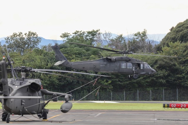 A UH-60 Black Hawk helicopter assigned to U.S. Army Aviation Battalion Japan transports patients to Commander Fleet Activities Yokosuka during a mass casualty exercise at Camp Zama, Japan, Oct. 5, 2023.