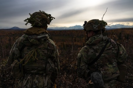 U.S. Army Soldiers from the 11th Infantry Airborne Division stand in front of the Alaska Mountain Range during a contact lane exercise at Delta Junction, Alaska, Sept. 29, 2023. Yudh Abhyas 2023 is a bilateral training exercise aimed at improving the combined interoperability of the Indian Army and the 11th Airborne Division to increase partner capacity for conventional, complex, and future contingencies throughout the Indo-Pacific region