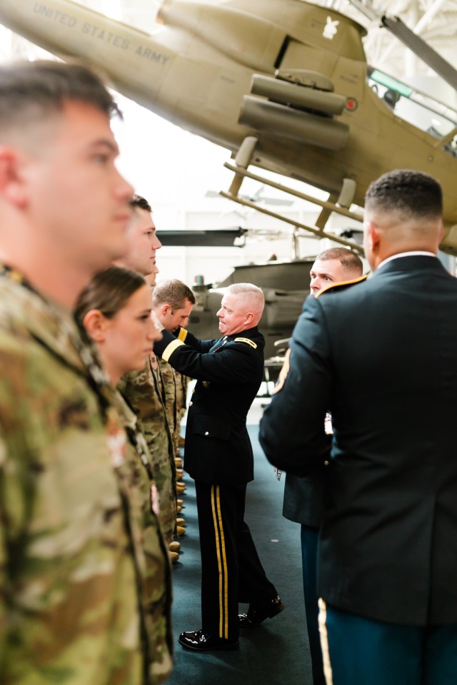 Maj. Gen. Michael C. McCurry, commanding general of the United States Army Aviation Center of Excellence and Fort Novosel, awards medals to the winners of the Iron Squad Challenge, an event to commemorate the 30th anniversary of the Battle of...