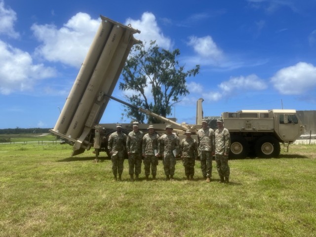 E3 ADA THAAD Soldiers and NCOs recognized by Task Force Talon pose for a photo with the Air Defense Artillery Commandant command team, Col. Curtis King, and Command Sgt. Maj. Giancarlo Macri during their visit to Guam.