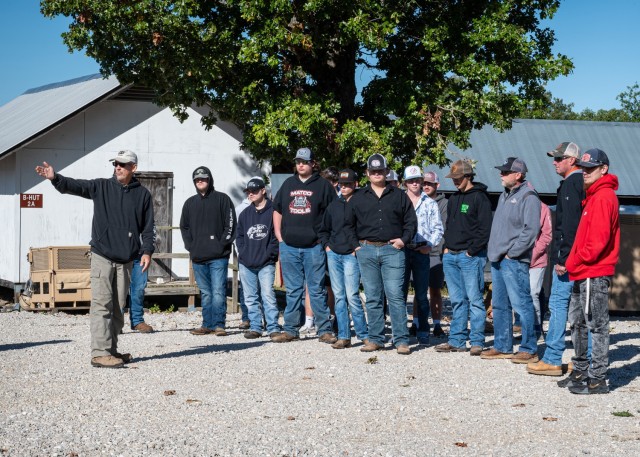 Craig White, facility manager for the Contingency Basing Integration and Technology Evaluation Center on Fort Leonard Wood, shows students from the Waynesville Career Center around the site during Tuesday’s field trip.