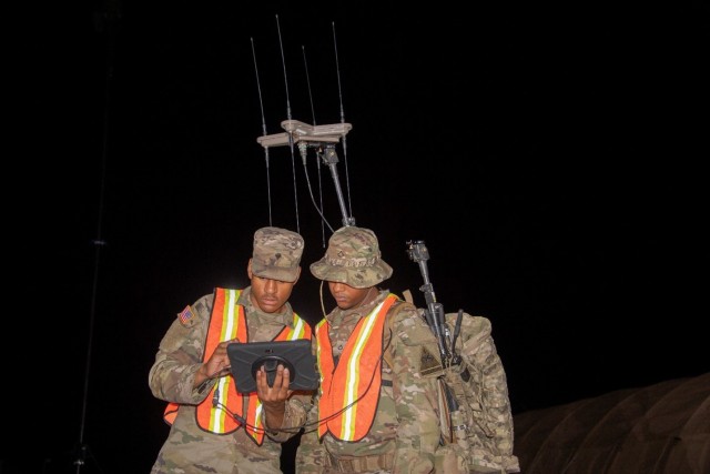 Soldiers from the 1st Armored Division engage in a tactical navigation scenario as part of PNTAX23 at White Sands Missile Range, New Mexico.