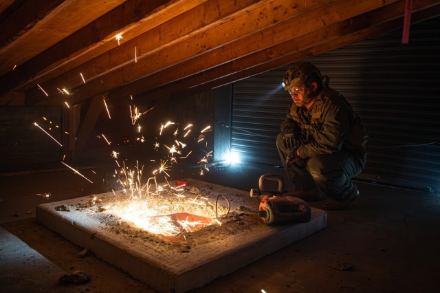 U.S. Army Soldiers assigned to 911th Technical Rescue Engineer Company (TREC) participate in urban search and rescue training during Exercise Capital Shield 2023 at the Fairfax County Fire and Rescue Academy, in Fairfax, Virginia, Sept. 21, 2023.