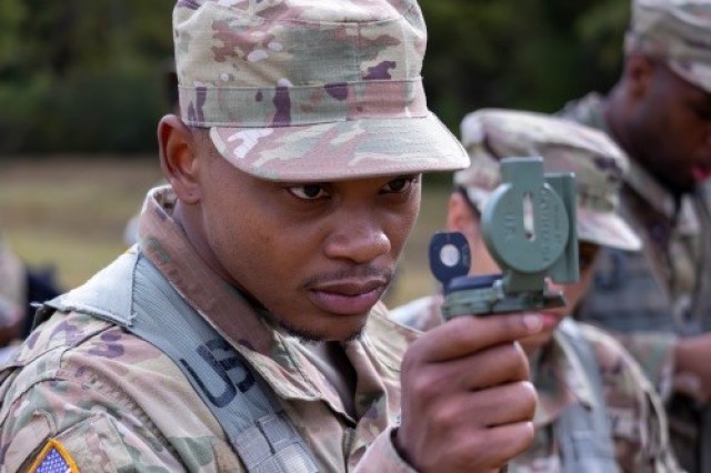  ROTC Cadet Entavious Briskey Chappelle calibrates his compass prior to a land navigation exercise at Redstone Arsenal.  