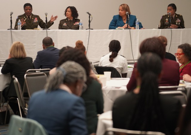 Lt. Gen. Donna Martin speaks to the crowd during the discussion. (Left to right: Lt. Gen. Donna Martin, Brig. Gen. Patricia Wallace, Chief Human Capital Officer Hong Miller and Command Sgt. Maj. Faith Alexander) 