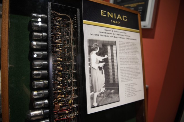 The display shows vacuum tubes from the original ENIAC computer. 