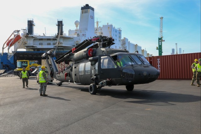 Dutch military and contractors provide port assistance for incoming US aviation brigade