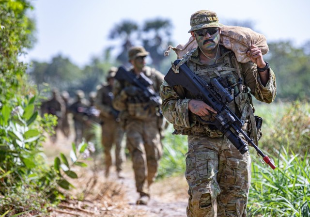 A group of Australian Defense Force (ADF) Soldiers, moves to their objective during a rehearsal for a Combat Live Fire Exercise during Exercise Super Garuda Shield 2023, at the 5th Marine Combat Training Center, Puslatpur, East Java, Indonesia., Sept. 9, 2023. Super Garuda Shield 2023 (SGS2023) is an annual exercise that has significantly grown in scope and size since 2009. SGS2023 is the second consecutive time this exercise has grown into a combined and joint event, highlighting the 7 participating and 12 observing nations&#39; commitment to partnership and a free and open Indo-pacific. 