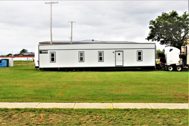 Construction of a third $28.08 million, four-story, 60,000-square-foot barracks begins at Fort McCoy