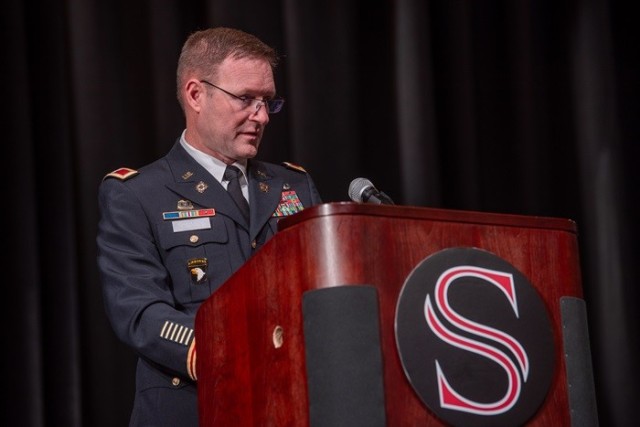 Garrison Commander Col. Brian Cozine describes the importance of Impact Aid during the kickoff event Oct. 12 at Sparkman High School. 