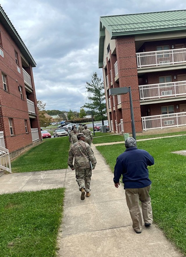 FORT DETRICK, Md. -- Leadership from U.S. Army Medical Research and Development Command at Fort Detrick, U.S. Army Garrison Fort Detrick, and the Army Housing Office take a tour of barracks and common areas being renovated here. 