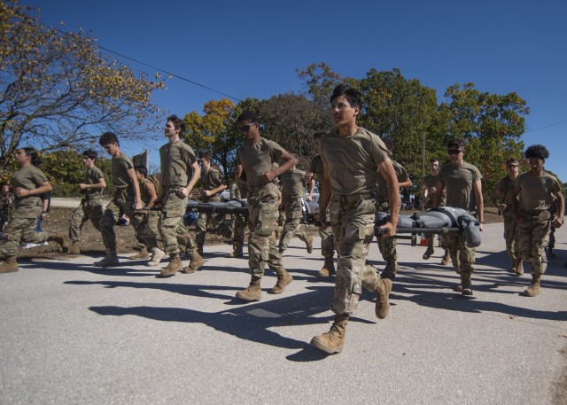 Junior ROTC cadets from Lafayette Central High School, in St. Joseph, Missouri, compete in the two-mile “gauntlet” event Saturday at Fort Leonard Wood’s horse stables, during a Raider Challenge event here.