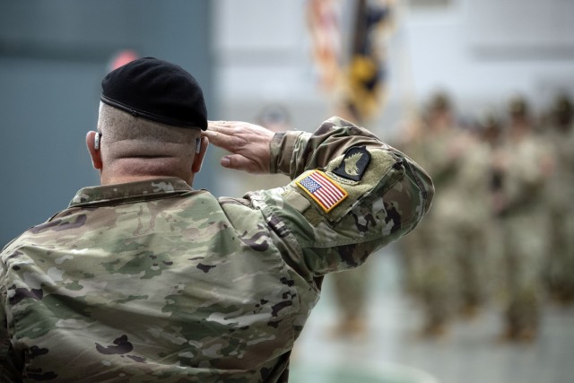 A Soldier salutes the colors during the playing of the National Anthem, Oct. 20, during the Task Force Marshall color encasing ceremony held at the McCrady Training Center in Eastover, S.C.