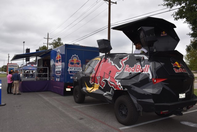 The Red Bull Pit Stop Tour came complete with a live DJ in a DJ truck Oct. 11 during a visit to the III Corps Express Shoppette. (U.S. Army photo by Janecze Wright, Fort Cavazos Public Affairs)