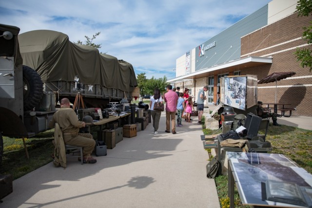 Visitors walk through the Historic Vehicle Rally Static Display Oct. 6, 2023, at the Clear Creek Exchange. Visitors were also allowed to sit in some of the vehicles and take photos. (U.S. Army photo by Blair Dupre, Fort Cavazos Public Affairs)