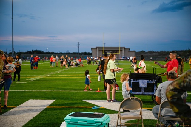 Families and organizations from across the installation fill Phantom Warrior Stadium on Oct. 3, 2023, during the National Night Out event. (U.S. Army photo by Eric Franklin, Fort Cavazos Public Affairs)