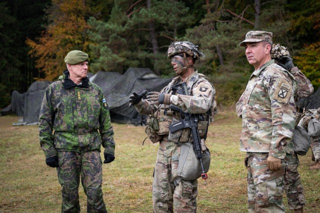 Lt. Gen. Pasi Välimäki, Commander of the Finnish Army, and U.S. Army Maj. Gen. Gregory Anderson, Commanding General of the 10th Mountain Division, meet with Soldiers during a battlefield circulation during Combined Resolve 24-01 at the Joint Multinational Training Center near Hohenfels, Germany, Oct. 24, 2023. 

Combined Resolve is a U.S. Army Europe and Africa exercise for U.S. Soldiers and NATO allies and partners, providing training in support of NATO deterrence initiatives. Approximately 4,000 soldiers from 14 nationals are participating in Combined Resolve 24-01. (U.S. Army photo by Staff Sgt. Dana Clarke)