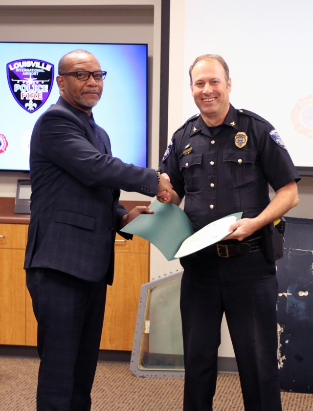 Chief Josh Grimes receives certificate of appreciation from Fort Knox CAC