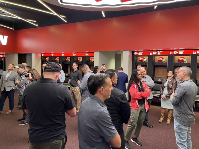 Information Operations Qualification Course students visit the Kansas City Chiefs locker room at Arrowhead Stadium, Kansas City, Mo., as part of an educational tour, Oct. 20, 2023. 