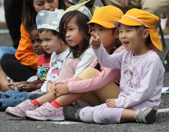 American and Japanese preschoolers watch a taiko drum performance during a Fall Festival at the Camp Zama Child Development Center in Japan, Oct. 31, 2023. More than 30 children, including local Japanese preschoolers, attended the annual festival.