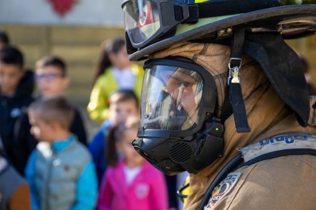 The 216th Engineer Firefighting Team, assigned to Army Support Activity – Black Sea, educate children at a primary school in Mihail Kogalniceanu, Romania about fire safety during Fire Prevention Week 2023.