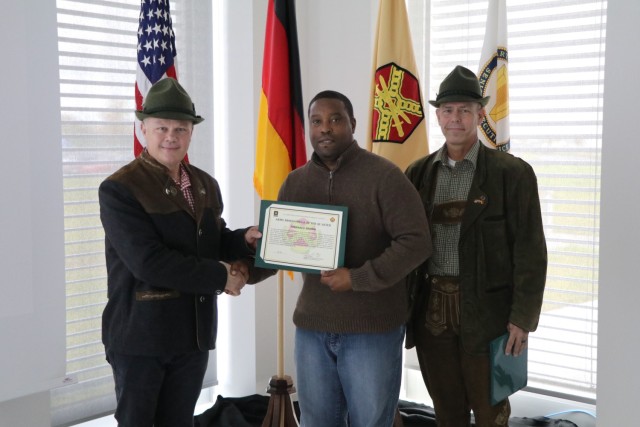 During the IMCOM-Europe town hall and Oktoberfest Oct. 27, Torrance Brown, receives the Army Professional of the Quarter award.