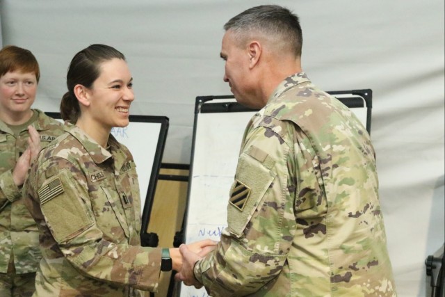 Servicemembers awarded unit coins for CPXIII