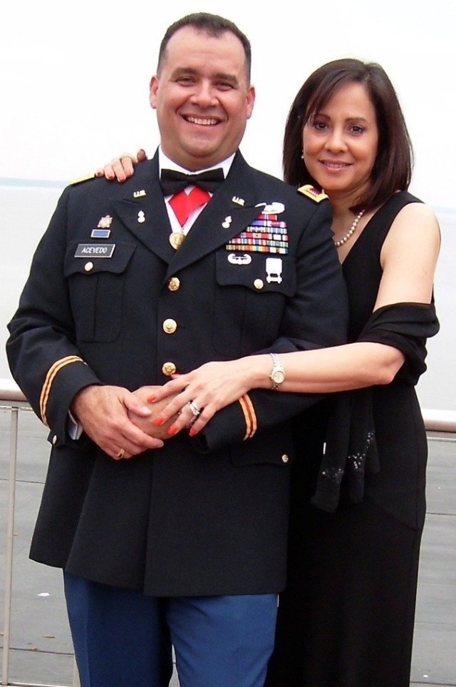 Angel Aceveda in uniform with his wife in 2009