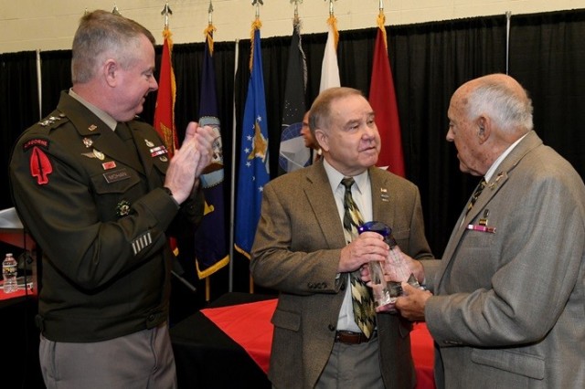 Participants in Friday’s 17th annual Veterans Prayer Breakfast include, from left, Lt. Gen. Chris Mohan, Army Materiel Command deputy commanding general and Redstone senior commander; Sam Bertling, secretary for the North Alabama Veterans and Fraternal Organizations Coalition; and retired Brig. Gen. Bob Drolet. 