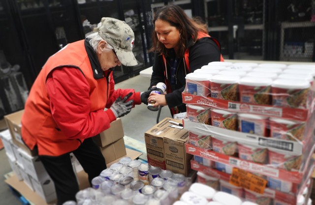 Red Cross packs over 120 sacks with food for Soldiers and their Families to enjoy during Thanksgiving