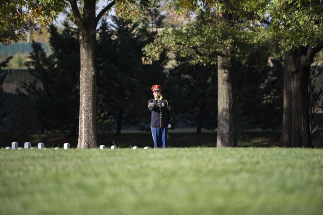 A bugler from the Army Band, &#34;Pershing&#39;s Own&#34; plays &#34;Taps&#34; in honor of the late Gen. (ret.) Colin Powell during a special military funeral in Section 60 of Arlington National Cemetery, Arlington, Va., Nov. 5, 2021.