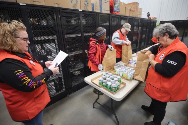 Red Cross packs over 120 sacks with food for Soldiers and their Families to enjoy during Thanksgiving