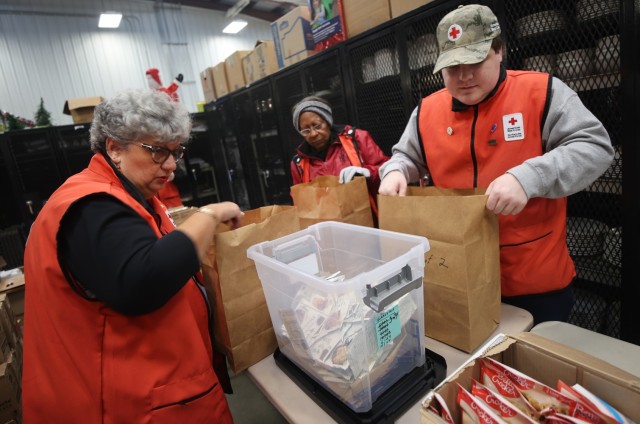 Red Cross packs over 120 sacks with food for Soldiers and their Families to enjoy during Thanksgiving