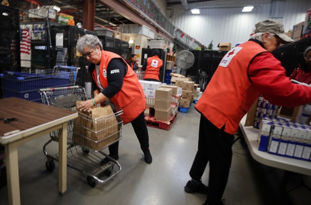 Red Cross packs over 120 sacks with food for Soldiers and their Families to enjoy during Thanksgiving