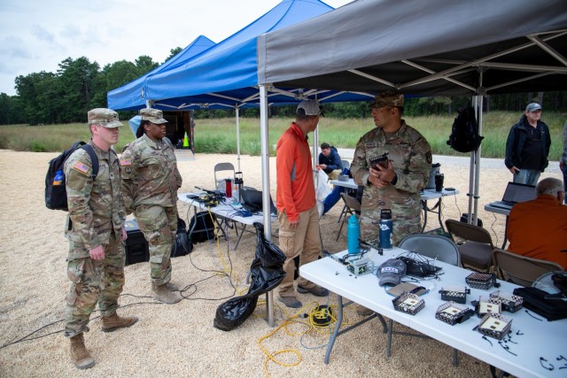 Army DEVCOM C5ISR Center personnel research the Relay for Air NLOS Ground Environments project during Network Modernization Experimentation 23 at Joint Base McGuire-Dix-Lakehurst, N.J., in August 2023. 