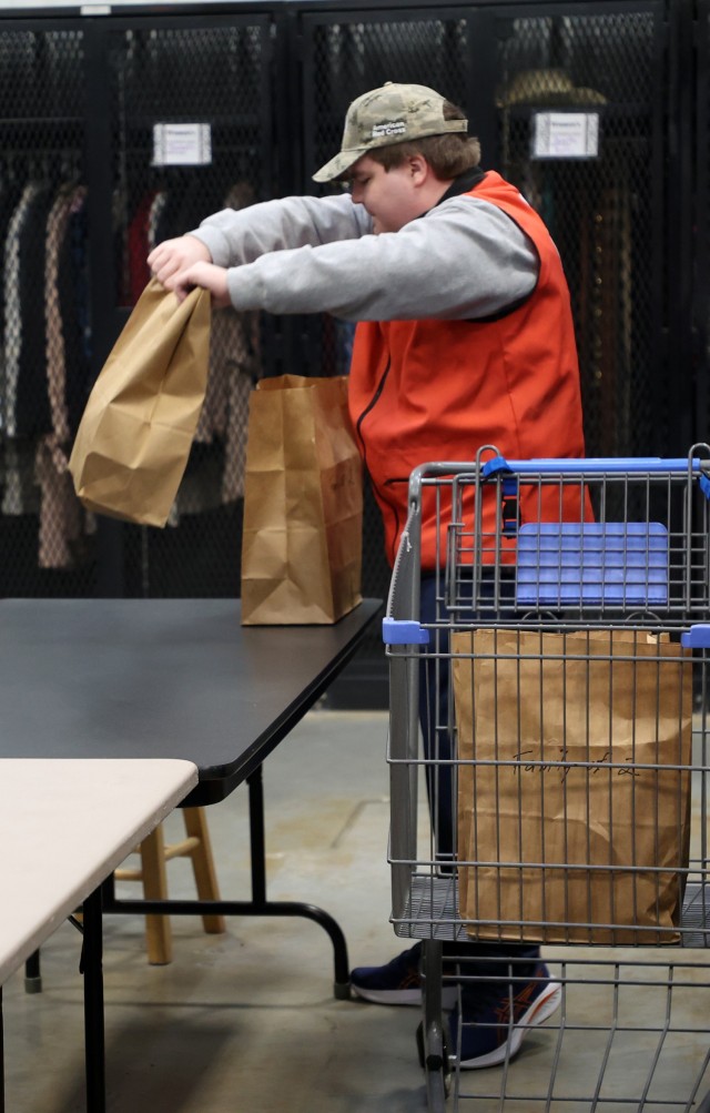 Red Cross packs over 120 sacks with food for Soldiers and their Families to enjoy during Thanksgiving
