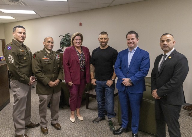 From left - Command Sgt. Maj. David M. Franks, Picatinny Arsenal garrison command sergeant major, Lt. Col. Alexander D. Burgos, Picatinny Arsenal Garrison Commander, Dr. Theresa Smith, Deputy Joint Program Executive Officer for JPEO Armaments and...