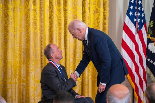 President Joe Biden awards the National Medal of Technology and Innovation to Rory Cooper at the White House on Oct. 24, 2023. Cooper, an Army veteran and Civilian Aide to the Secretary of the Army who holds more than 20 U.S. patents was awarded the medal for developing innovations in wheelchair technology and helping to strengthen the nation’s well-being. Cooper has dedicated his career to helping veterans to lead full and rewarding lives through engineering and advancing assistive technology. He is the director and founder of the Human Engineering Research Laboratory, a collaboration between Veterans Affairs and the University of Pittsburgh.