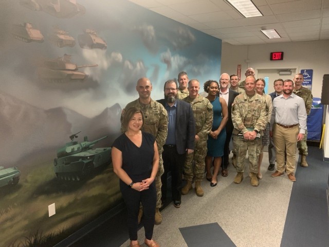 Members of the Next Generation Combat Vehicles Cross-Functional Team, pictured at Detroit Arsenal, Michigan, include employees who additionally serve in the National Guard or Army Reserve.