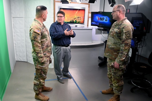 U.S. Army Yuma Proving Ground (YPG) Commander Col. John Nelson (right) and Command Sgt. Maj. Mark Millare (left) get a tour of the KYMA-TV studio from General Manager Dave Miller on November 13, 2023.