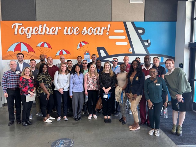 Group photo of the Industry Based Broadening: Logistics seminar participants at Amazon’s automated fulfillment center in Garner, North Carolina, on
April 19, 2023.