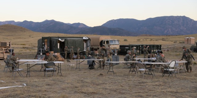Soldiers from 4th Sustainment Brigade, 4th Infantry Division, along with Soldiers from throughout the Ivy Division, utilize the field dining area Oct. 1, 2020, to
eat their breakfast while following the COVID-19 restrictions.