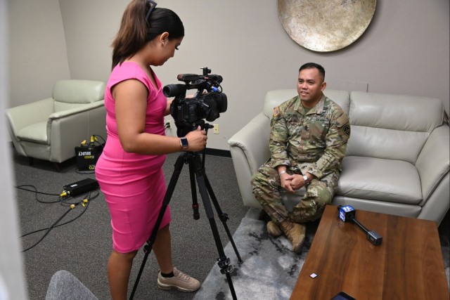 U.S. Army Yuma Proving Ground (YPG) Command Sgt. Maj. Mark Millare is interviewed by KYMA-TV reporter Valeria Rodriguez at the KYMA studios on November 13, 2023.