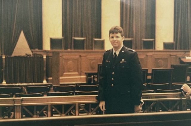 Minoque as an USAF 1st Lt. standing in the U.S. Supreme Court