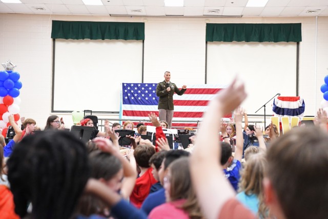 Lt. Col. Jordan Dilena, the Aviation and Missile Command executive officer, addresses the Veterans Day assembly Nov. 1 at Jones Valley Elementary School. 


