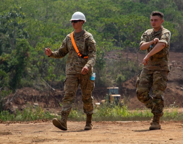 U.S. Army Cpl. Shane Crawford walks with U.S. Army Pfc. David Hadella, both heavy equipment operators with the 84th Engineer Battalion, 130th Engineer Brigade, 8th Theater Sustainment Command, during the construction of a new range at Fort Magsaysay, Philippines, April 14, 2023, during Exercise Balikatan. Exercise Balikatan, Tagalog for “shoulder-to-shoulder,” is an annual bilateral exercise between the Armed Forces of the Philippines and the U.S. military. The exercise provides unique opportunities for participating forces to increase interoperability and provide tangible benefits for the people of the Philippines. Balikatan is an annual exercise between the Armed Forces of the Philippines and U.S. Military designed to strengthen bilateral interoperability, capabilities. (U.S. Army photo captured by Sgt. Tristan Moore)