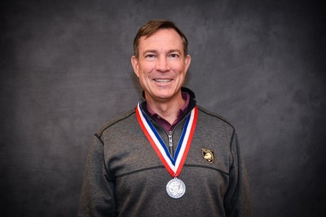Retired Col. Will Johnson wears the medal he received from being inducted into the Madison County Military Heritage Commission’s Hall of Heroes. 